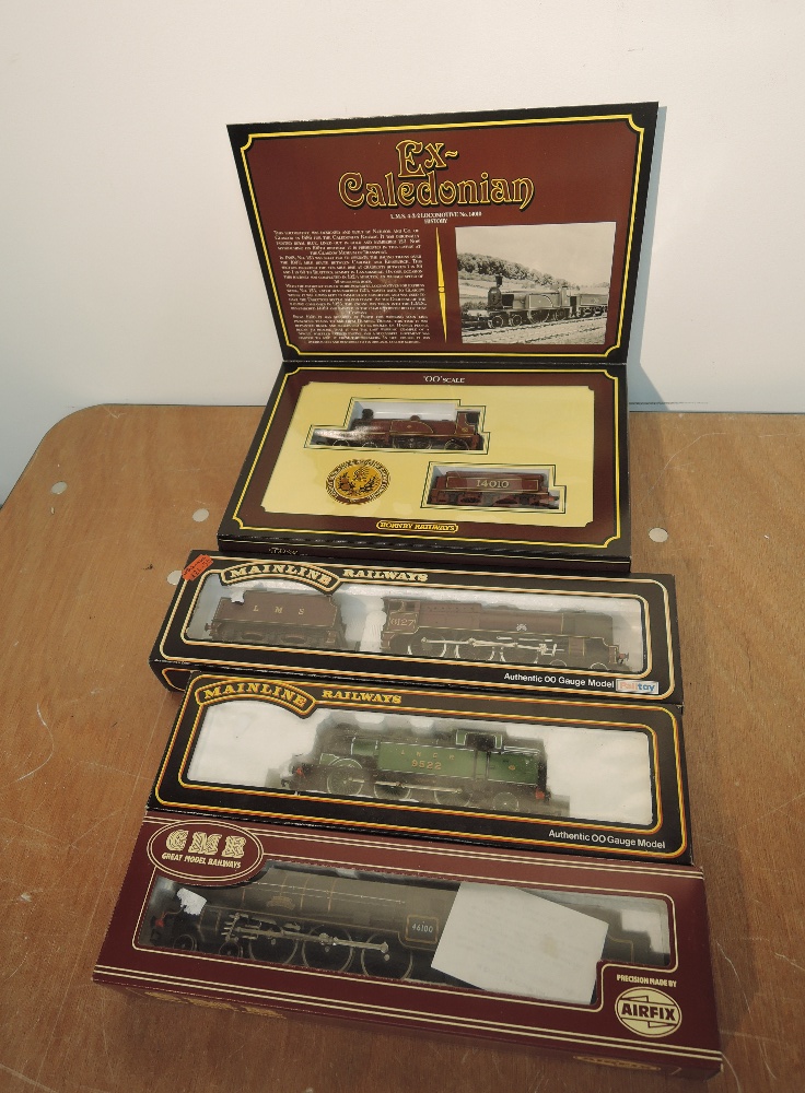 A Hornby 00 gauge Ex-Caledonian LMS 4-2-2 Loco & Tender 14010 in display box R763 along with two