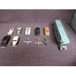 Eleven playworn Dinky diecasts, 40A Riley Saloon, 108 MG Midget, 133 Cunningham C-SR, 139B Hudson