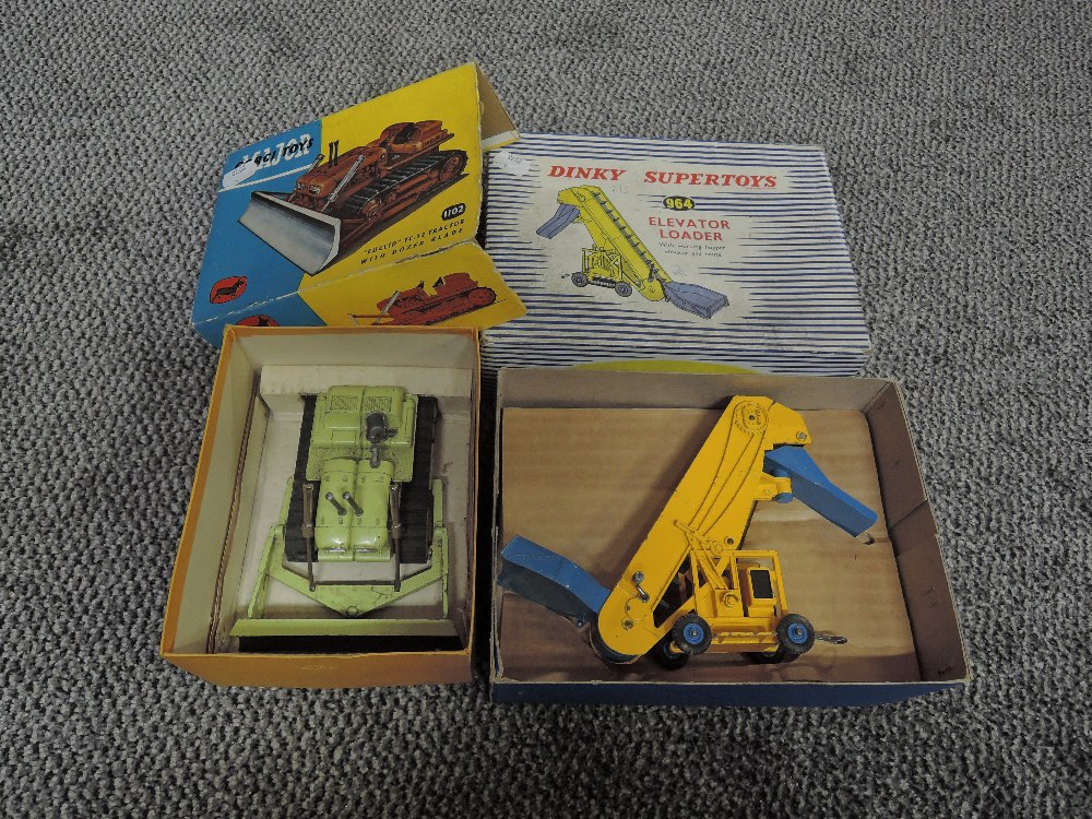 A Dinky Supertoy diecast, 964 Elevator Loader in yellow and blue in original blue and white