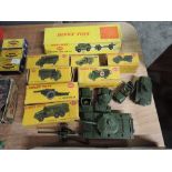 Fourteen Dinky Military diecasts, 697 25-Pounder Field Gun Set, 621 3-Ton Army Wagon, 623 Army