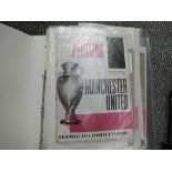 Two folders containing Manchester United Match Day Programmes 1966-1998 including Partizan 13 Aprila