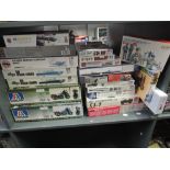 A collection of Twenty Three mixed scale plastic Military related Kits including Italeri 1:9 US WWII