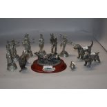 A selection of metal and pewter cast figures including five Cries of London series