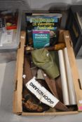 A Box of mixed Australian interest items including books, boomerangs and more.