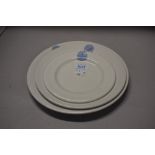 Three graded plates,'Royal Lancashire agricultural society' emblem to tops in blue on white ground.