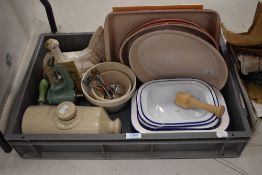 A kitchen themed collection including oven dishes, four enamel pie dishes and three enamel plates,