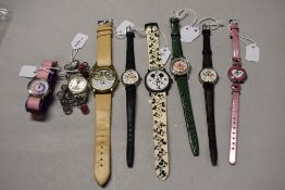 Eight ladies/girls fashion watches including Mickey mouse and teddy bear.