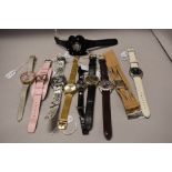 Ten ladies watches, various brands including Playboy, Armani, Oasis and more.