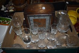 An Art Deco mantel clock and a selection of assorted drinking glasses and salts etc.