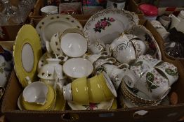 Four part tea services including Colclough with yellow and gold banded decoration (16 pieces