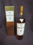 A bottle of The Macallan Ten Year Old Highland Single Malt Scotch Whisky, 40% vol 700ml, in card