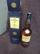 A bottle of The Glenlivet 18 Year Old Single Malt Scotch Whisky, 43% vol, 70cl, with paper wrap