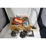 A small box of mixed vintage fishing tackle including hooks, weights and two spinning reels one