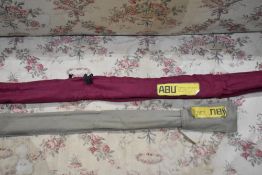An Abu Atlantic 443 s zoom and an Abu Farflyte 1079 9 1/2ft fly rod in original sleeves