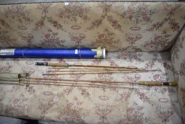 A 3 pc split cane fly rod with extra tip but no makers name and a 2 piece split cane fly rod with