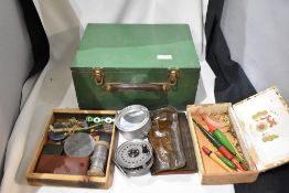 A wooden box containing mixed fishing tackle including a Youngs fly reel