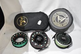A Leeda profil 7/8 fly reel with spare spool in a canvas case and an Intrepid Dragonfly fly reel