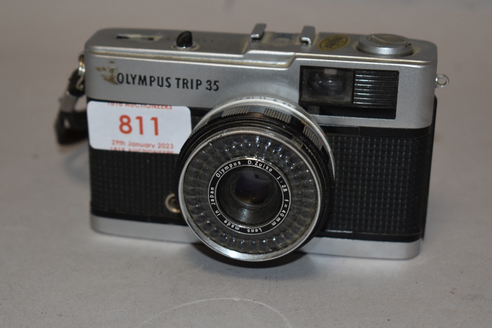 An Olympus Trip 35 camera with a D Zuiko 1:2,8 f=40mm lens