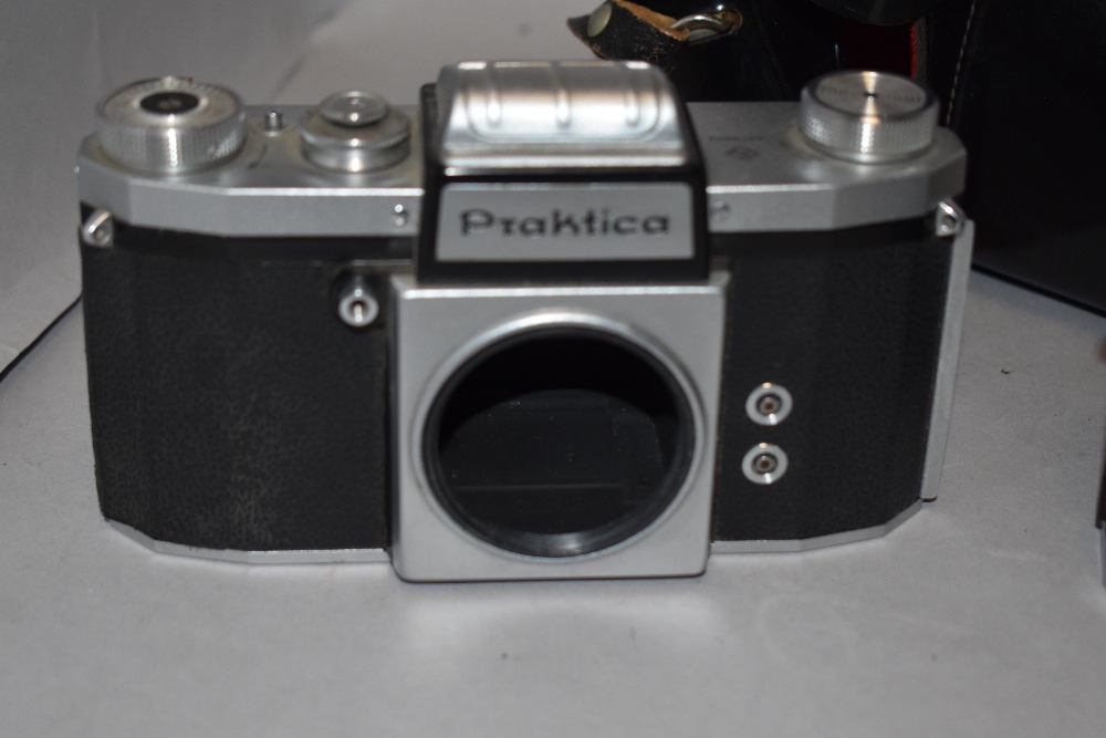 Three Praktica cameras. A Praktica LLC camera with Meyer-Optik Gorlitz Oreston 1,8/50 lens. A - Image 2 of 6