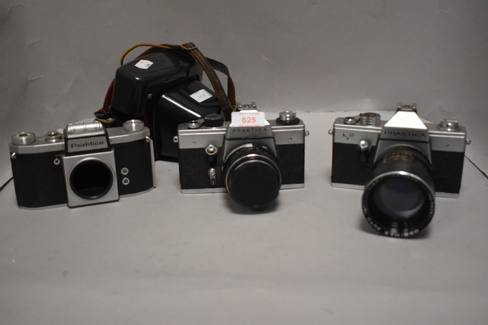 Three Praktica cameras. A Praktica LLC camera with Meyer-Optik Gorlitz Oreston 1,8/50 lens. A