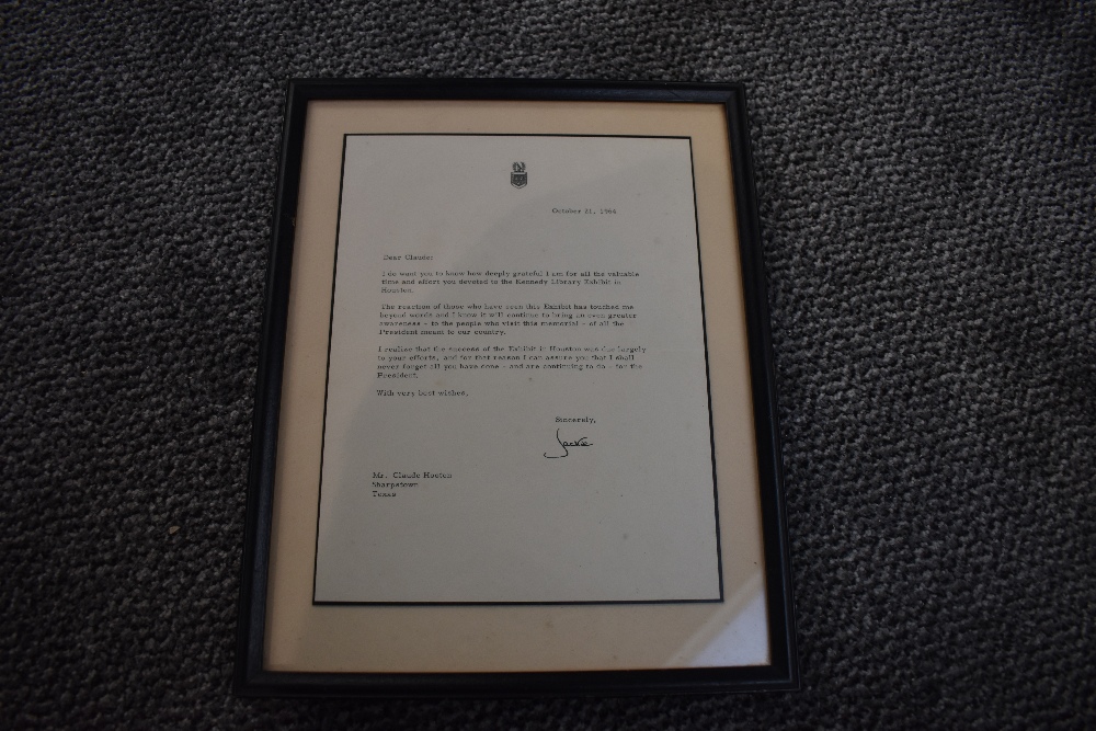Jacqueline Kennedy Onassis (1929-1994). A framed typed letter, dated Oct. 21st, 1964, and signed '