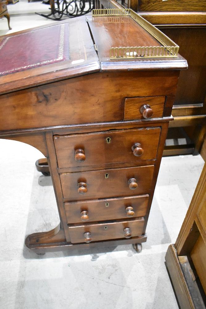 A late 19th century walnut Davenport, having brass three quarter gallery, stained leather skiver and - Image 3 of 4