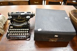 Two early 20th century typewriters including Corona and Imperial