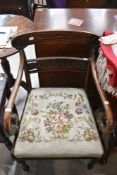 A Victorian carver chair having simulated Roseswood stained beech frame with carved back and
