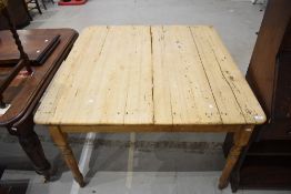 A farm house style pine utility table with plank top. 75cm H x 115cm W x 115cm D