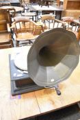 An early 20th century gramophone record player with horn.