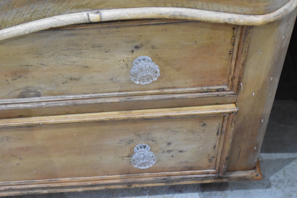 A reclaimed pine chest of drawers, the serpentine fronted rectangular top above two blind frieze - Image 2 of 2