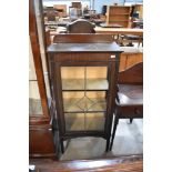 An early 20th century display case having a leaded light door on mahogany frame. 60cm W x 127cm H