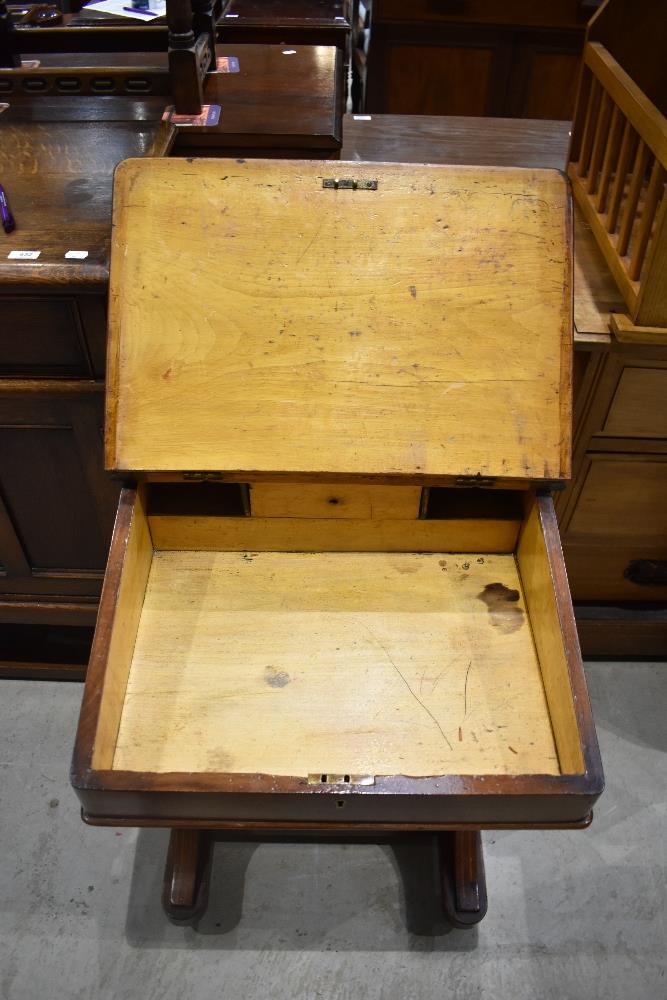 A late 19th century walnut Davenport, having brass three quarter gallery, stained leather skiver and - Image 2 of 4