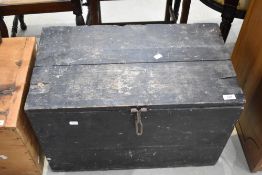 A vintage rustic wood tool box of small proportions