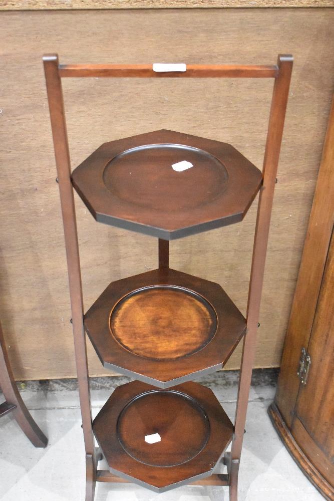 An early 20th Century mahogany folding cake stand , of triple octagonal tier form - Image 2 of 2