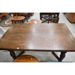 An Old Charm style extending dining table having Oak frame on turned legs. 160cm long or 240cm