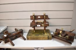 Three antique joiners adjustable moulding planes in beech wood.