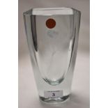 A modern art glass vase having an engraved Phoenix design on heavy set aqua glass. Signed