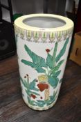 A Chinese porcelain stick or umbrella stand with famille vert decoration