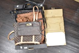A selection of modern ladies leather hand bags including a modern bag bearing the label for Luis