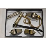 A selection of early 20th century whistles including three Acme Thunderer, a Hudson ARP and a Hudson