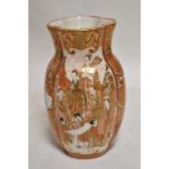 An antique Japanese Kutani ware porcelain vase having shaped form with two hand decorated panels