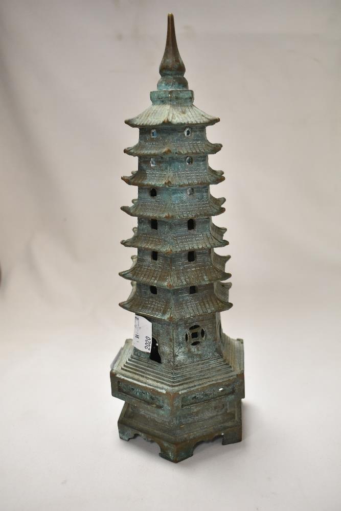 An antique bronze cast censor in the form of a Chinese pagoda, possibly early 18th century. 30cm - Image 2 of 2