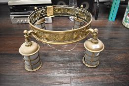 An early 20th century brass ceiling light with pierced frame and four branches with lanterns.