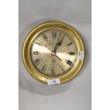 A reproduction brass cased nautical ships style clock