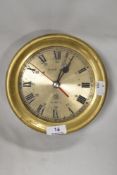 A reproduction brass cased nautical ships style clock