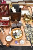 A mixed selection of items including two bakelite tobacco jars, a revolving desk top calendar and