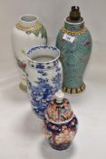 Four oriental vases including Imari urn AF, Famille Rose lamp base, transfer printed blue and