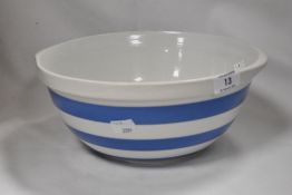 An early 20th century TG Green kitchen mixing bowl in blue and white with green back stamp.