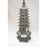 An antique bronze cast censor in the form of a Chinese pagoda, possibly early 18th century. 30cm